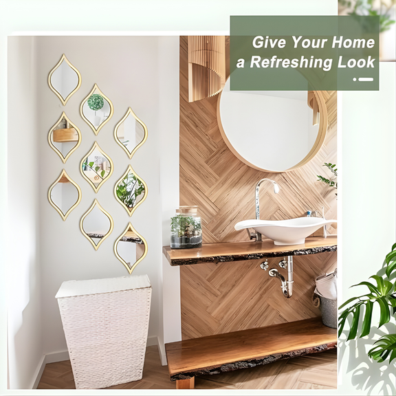 ArcDew Leaf Shape Acrylic Mirror Decals Gold Trim Modern Decor UAE - arcdew.com - ArcDew special branded acrylic leaf-shaped mirror decals with gold trim arranged vertically on white wall.