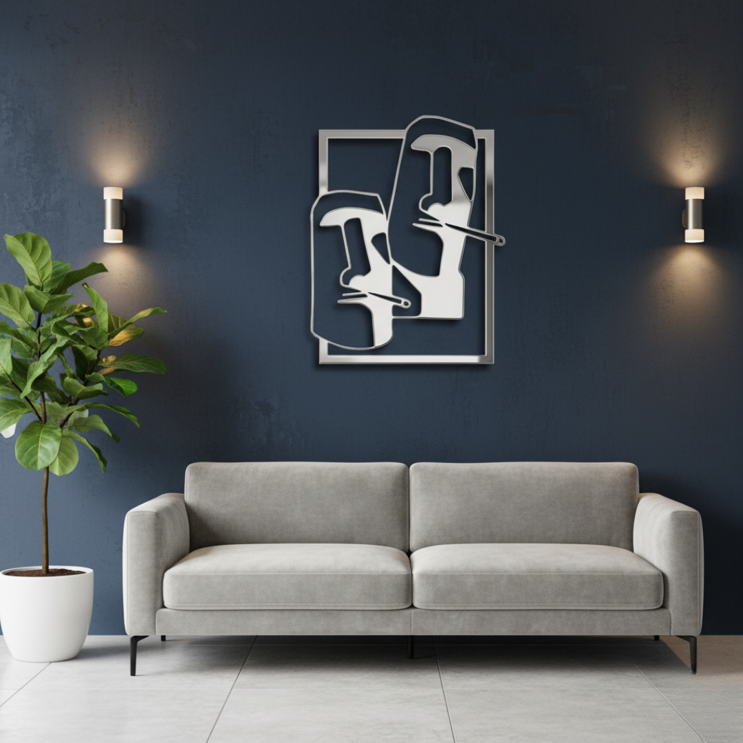 ArcDew Two Faces Moai Wall Art Frame | Modern Abstract Home Decor - arcdew.com - ArcDew branded silver acrylic Two Faces Moai wall art frame above gray sofa on navy wall.