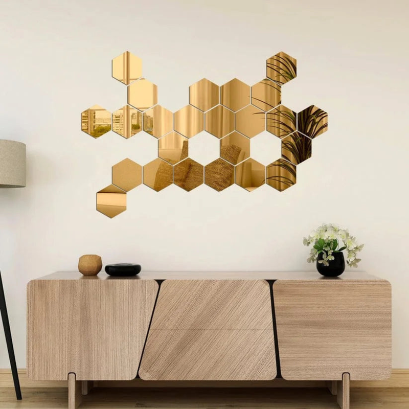 ArcDew Hexagon Acrylic Mirror Wall Decals Decor UAE - arcdew.com - ArcDew branded special acrylic hexagon mirror wall decals in gold arranged above wooden sideboard.