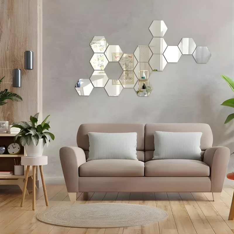 ArcDew Hexagon Acrylic Mirror Wall Decals Decor UAE - arcdew.com - ArcDew branded special acrylic hexagon mirror wall decals in silver above beige sofa.