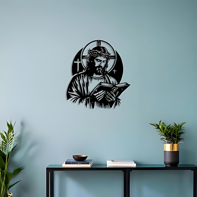 ArcDew Jesus Christ with Book – Christian Home Wall Decal UAE - arcdew.com - ArcDew branded black acrylic Jesus Christ with book wall decal on blue wall.
