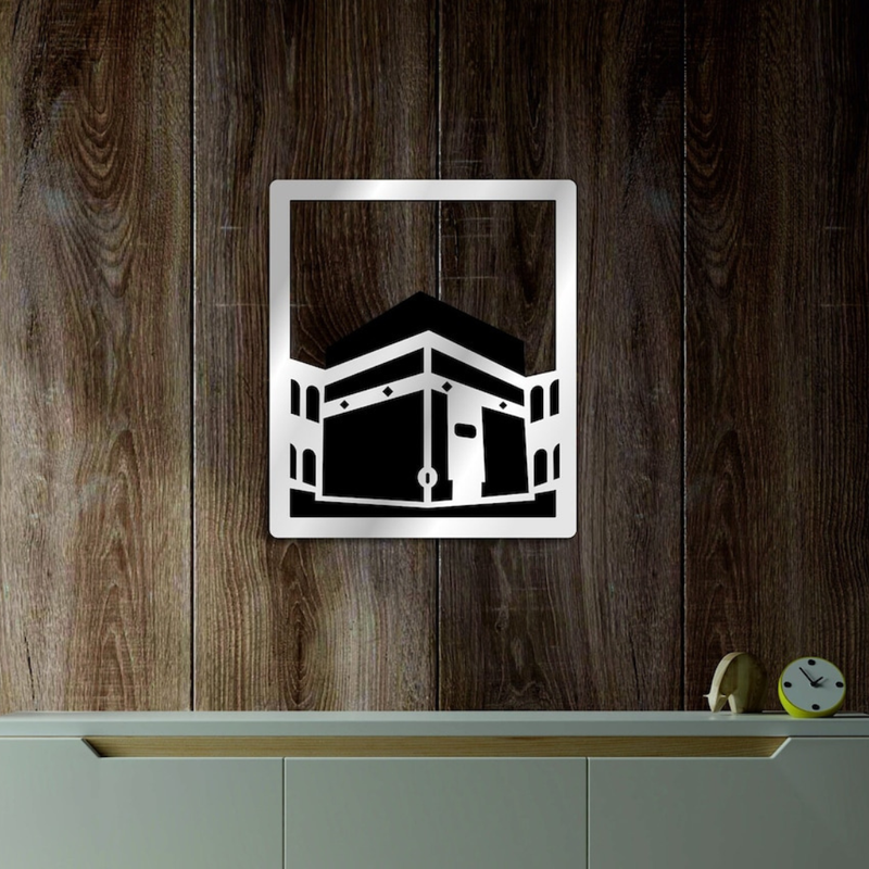 ArcDew Kaaba Wall Art Frame | Baitul Allah Islamic Home Decor - arcdew.com - ArcDew branded acrylic wall art featuring Kaaba silhouette in silver frame on wooden background.