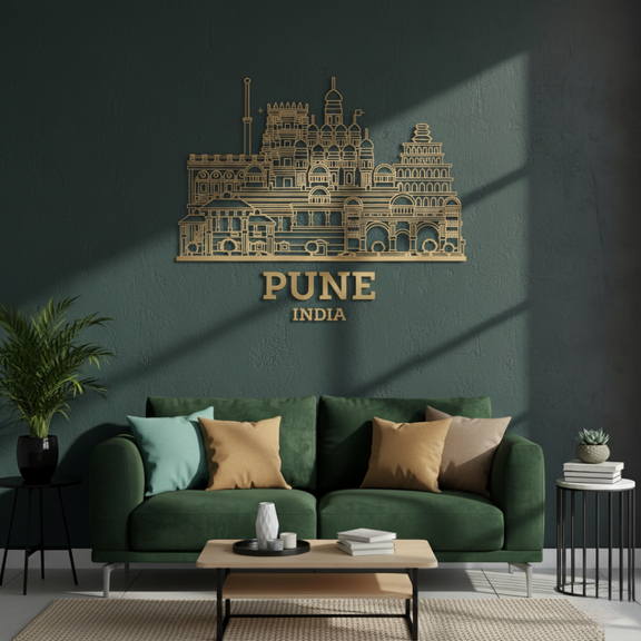 ArcDew: Pune, India City Skyline Wall Art for UAE Homes - arcdew.com - ArcDew special branded acrylic Pune India city skyline wall art in gold above green sofa.
