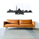 ArcDew Rome Italy Skyline Decal Minimalist Travel Art - arcdew.com - ArcDew branded black acrylic Rome skyline decal with minimalist design above brown leather sofa.