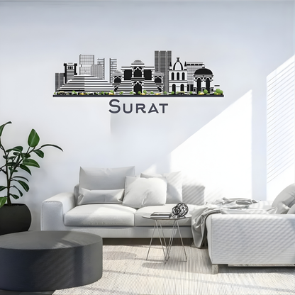 ArcDew: Surat, India City Skyline Wall Art Decal | Heritage Decor for UAE - arcdew.com - ArcDew branded acrylic black Surat city skyline wall decal above white sofa in modern living room.