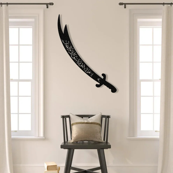 ArcDew Zulfiqar Sword Hazrat Alis Sword Moharram Decal UAE - arcdew.com - Black acrylic ArcDew Zulfiqar sword wall decal with Islamic calligraphy above chair.