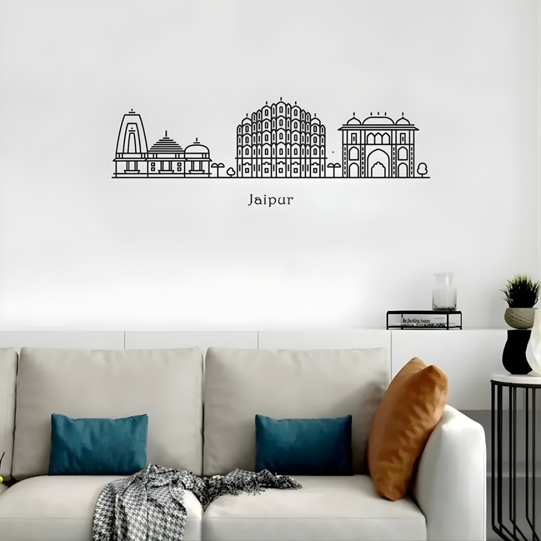 Arcdew Acrylic Black Jaipur Skyline Wall Art for Home Decor - arcdew.com - Arcdew branded black acrylic Jaipur skyline wall art above sofa with cushions.