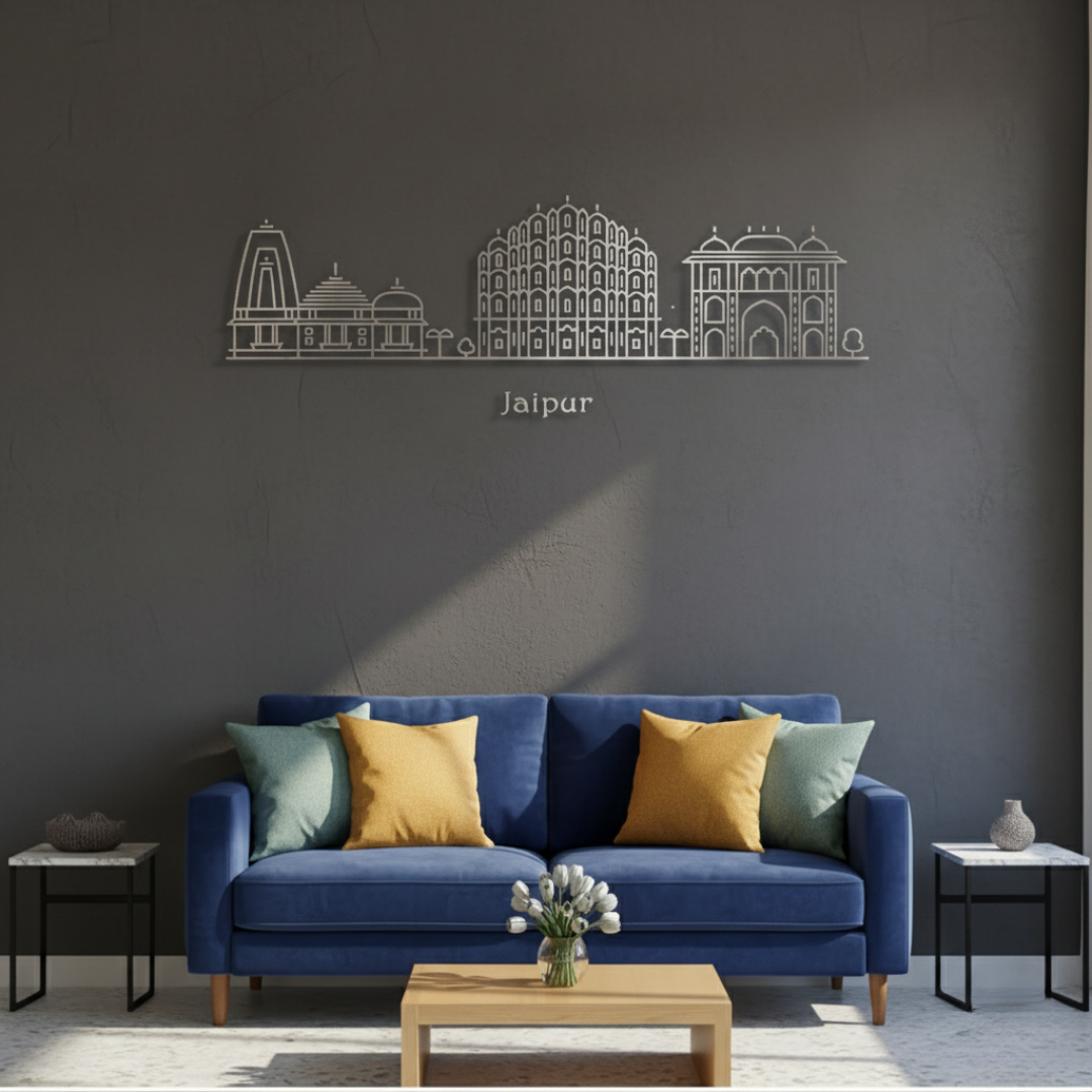 Arcdew Acrylic Black Jaipur Skyline Wall Art for Home Decor - arcdew.com - Arcdew branded acrylic black Jaipur skyline wall art above blue sofa with yellow cushions.