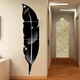 Arcdew Decorative Acrylic Feather Mirror Wall Decal | Modern UAE Home Decor - arcdew.com - Arcdew branded black acrylic feather mirror wall decal with glossy reflective finish.