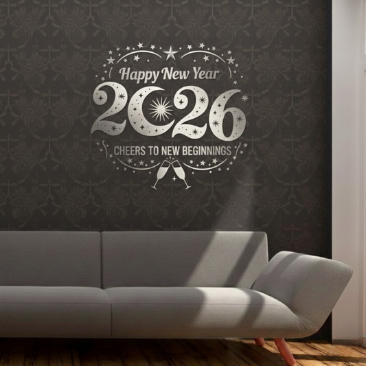 Decorative wall sticker with 'Happy New Year 2026 Cheers to New Beginnings' text on a dark wall.