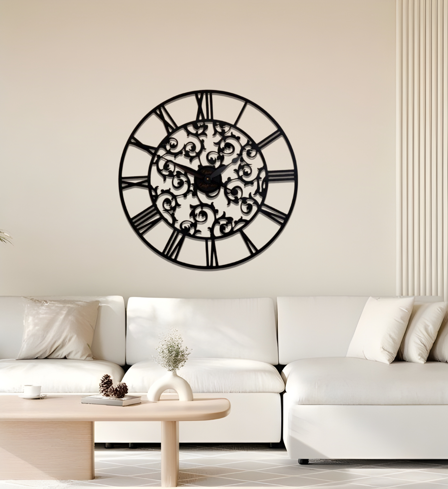 Decorative wall clock on a wall above a white sofa in a living room.