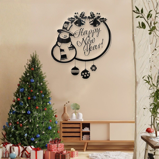 Decorative wall art with penguin design and 'Happy New Year!' text above a Christmas tree and gifts.