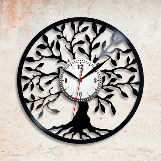 Decorative wall clock with tree design on a beige background